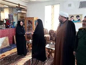 تجليل از خانواده شهيد فردين قوردوئي ميلان در پلدشت